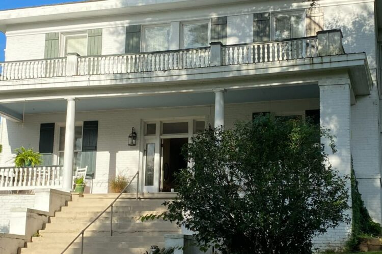 Steps up to welcoming front porch