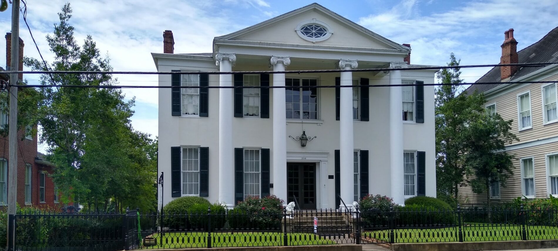 Ground level Main entrance and porch for this historic property